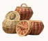 A group of woven baskets with natural-toned patterns.